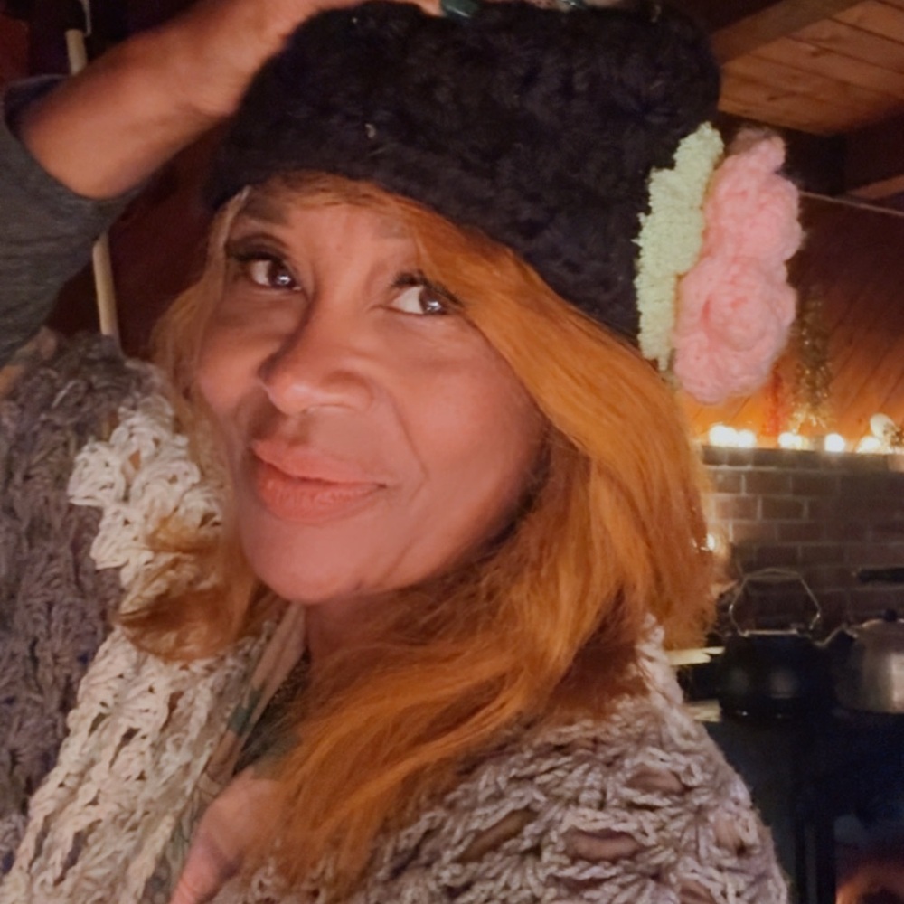 Stylish Black Knit Hat with Floral Accents